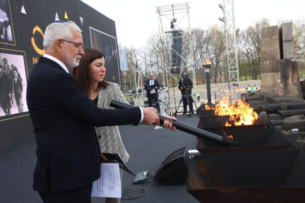 Impact entrepreneur and philanthropist Haim Taib lights memorial torch at Auschwitz in historic first, as annual Holocaust memorial march marks plight of Jews from Tunisia and North Africa
