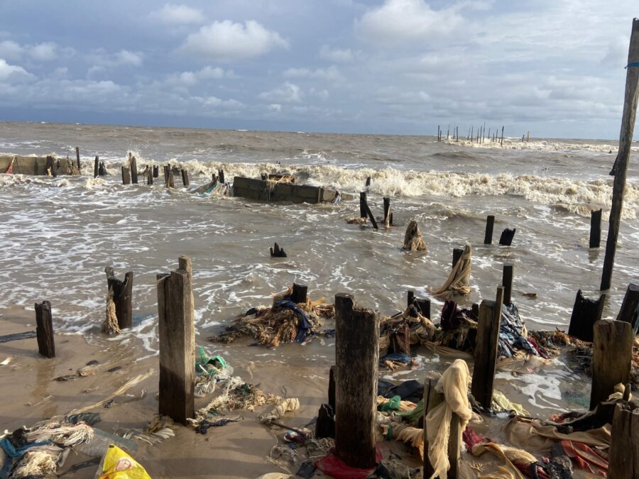 The_remains_of_buildings_lost_to_the_sea_in_Ayetoro-scaled-e1686046198185