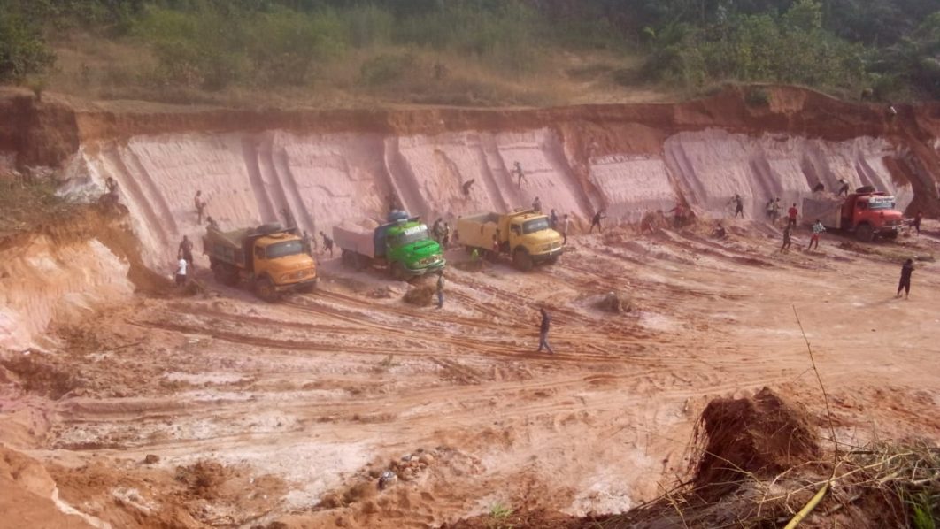Tipper excavating sand in the area