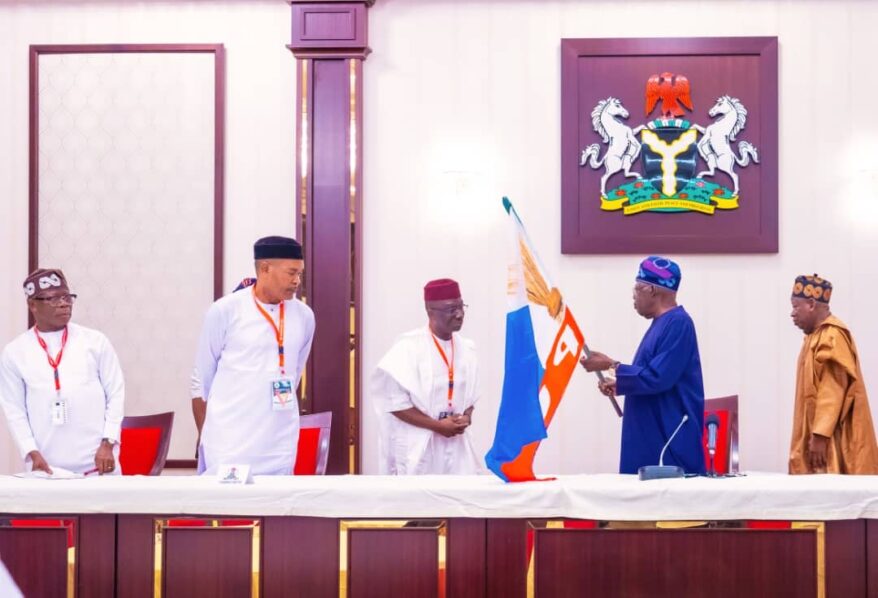 Tinubu presents APC flag to Edo candidate Monday Okpebholo