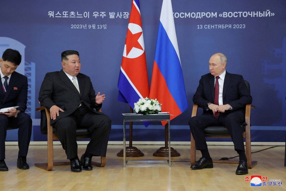 FILE PHOTO: Russia’s President Putin and North Korea’s leader Kim meet in Amur region