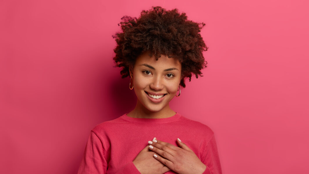 Woman in pink. Photo by Freepik