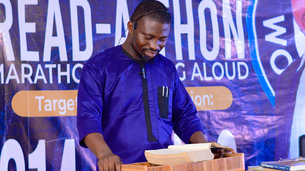 samson-reading-at-a-lectern