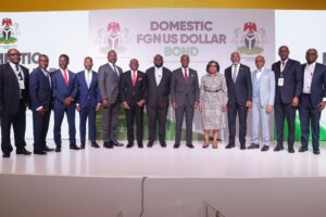 Minister of Finance and Coordinating Minister of the Economy,  Wale Edun (middle) at the inauguration of the dollar-denominated FGN bond.