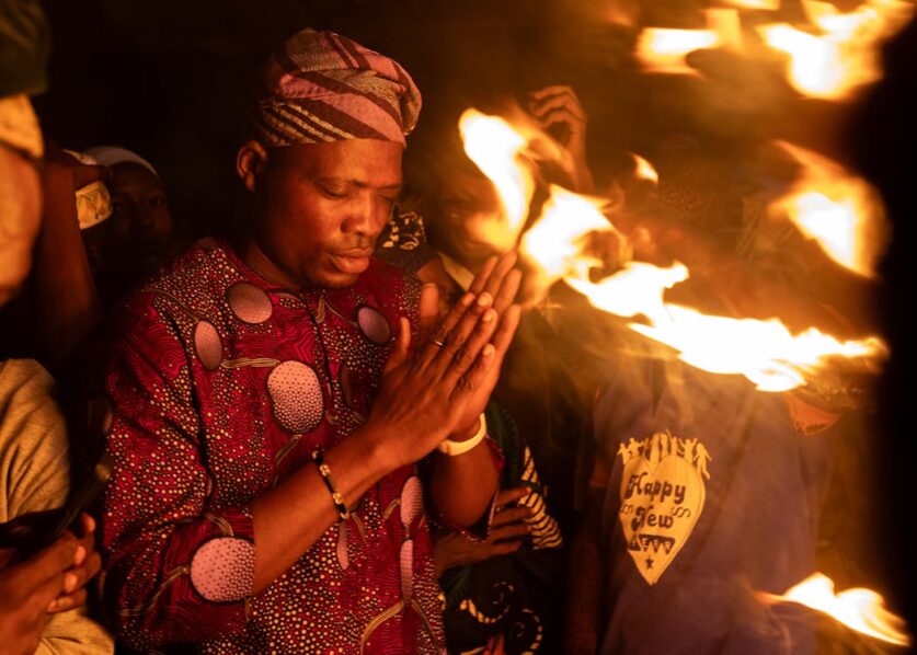 A man praying after fire outbreak. Photo from Stephanie Douglas on Pexels