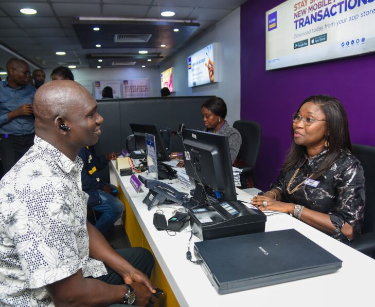 Mrs. Yemisi Edun, Managing Director, First City Monument Bank (FCMB), connected with customers and served them at the bank's Head Office branch in Lagos. Pictured with her is a customer, Mr. Olawale Thompson.