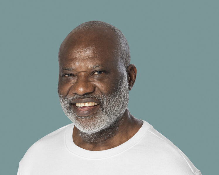 A man with grey beards and hair.
