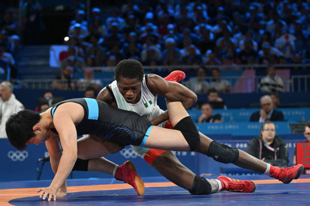 Odunayo-Adekuoroye-wrestling