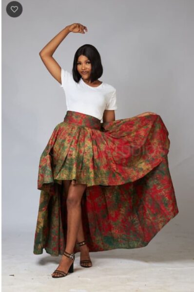SleyCrafts Fashion Ltd, led by Mercy John Otisi, unveils Angels' Cadets, a striking collection blending Ankara and lace in contemporary designs. With bold tailoring and intricate pleating, the collection highlights craftsmanship while hinting at areas for refinement in garment construction.