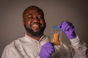 Temidayo holding Egusi specimen (Image Credit_ Jaguar Space_Ivan Castro Guatemala).jpg (1)
