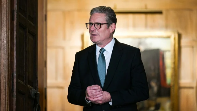 Britain’s Prime Minister Keir Starmer waits for the arrival of France’s President Emmanuel Macron at the Chequers, in Aylesbury, England, on January 9, 2025 ahead of a bilateral meeting