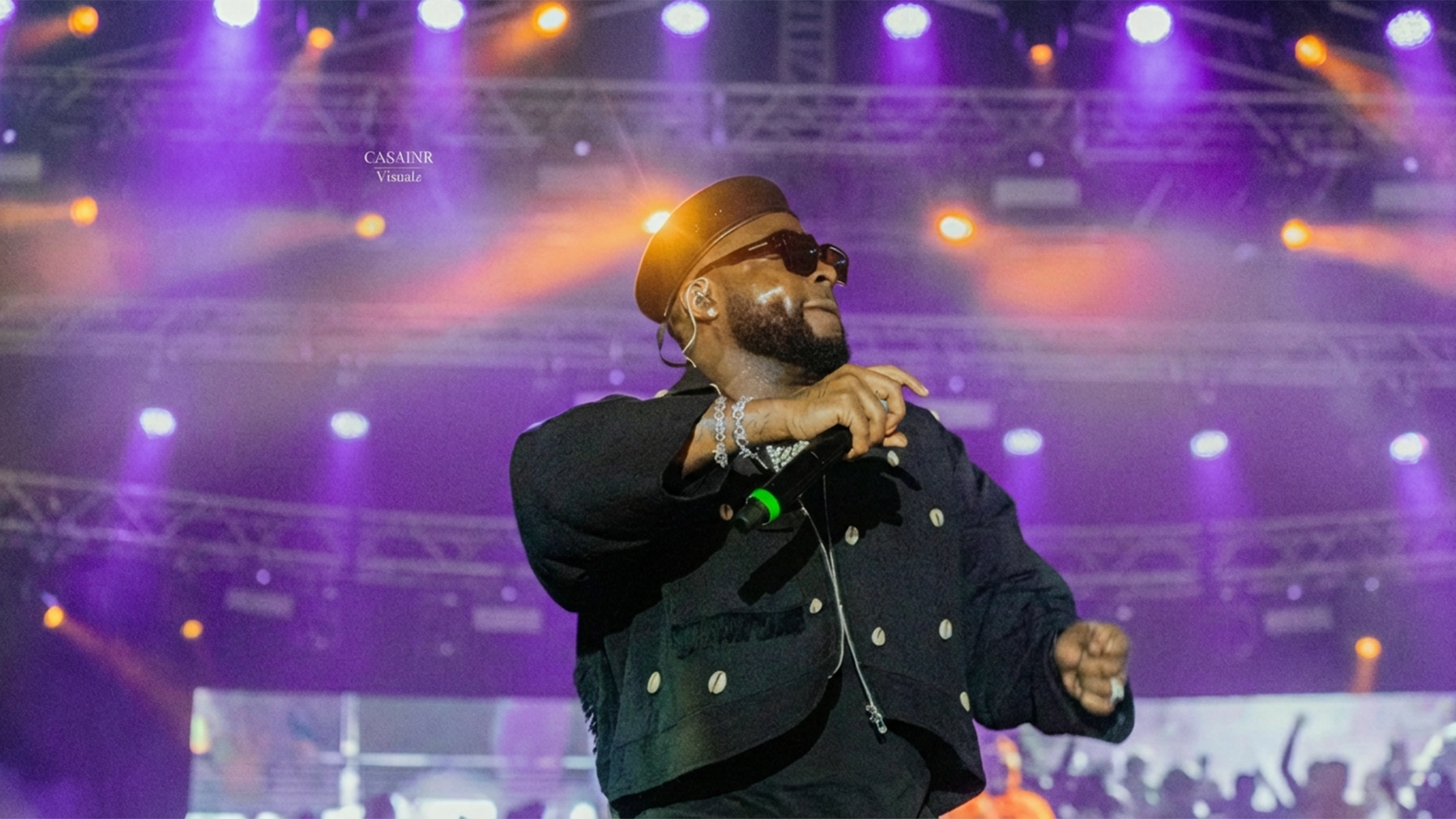 Davido performing on stage during the Uyo leg of the 5ive Tour