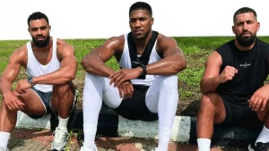 Anthony Joshua (middle) flanked by Sina Ghami and Lateef Ayodele, who died in a ghastly motor accident along the Lagos-Ibadan Expressway on Monday.