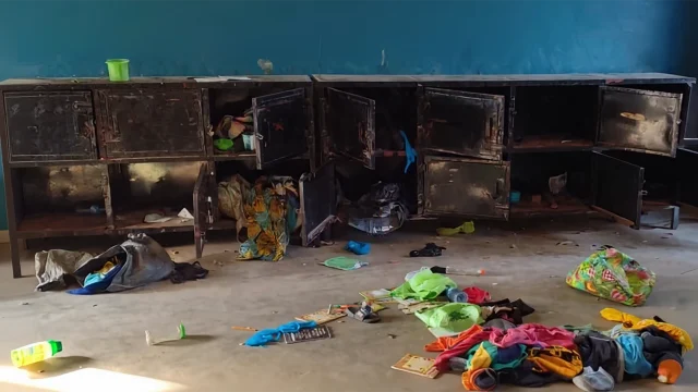 This handout photo taken by Reverend Bulus Dauwa Yohanna, Chairman of the Christian Association of Nigeria (CAN) of Niger state chapter and Catholic Bishop of Kontagora Diocese on November 21, 2025 and distributed on November 22, 2025 shows relatives of abducted children pose for a photograph in the courtyard of St. Marys Catholic School in Papiri, Agwarra local government, Niger state. A Christian group on November 22, 2025 said 315 students and teachers were seized a day earlier in Nigeria’s second mass school abduction in a week, as security fears mounted in Africa’s most populous nation. The early November 21, 2025 raid on St Mary’s co-education school in Niger state in central Nigeria came after gunmen on November 17, 2025 stormed a secondary school in neighbouring Kebbi state, abducting 25 girls. (Photo by Bulus Dauwa Yohanna / Christian Association of Nigeria (CAN)