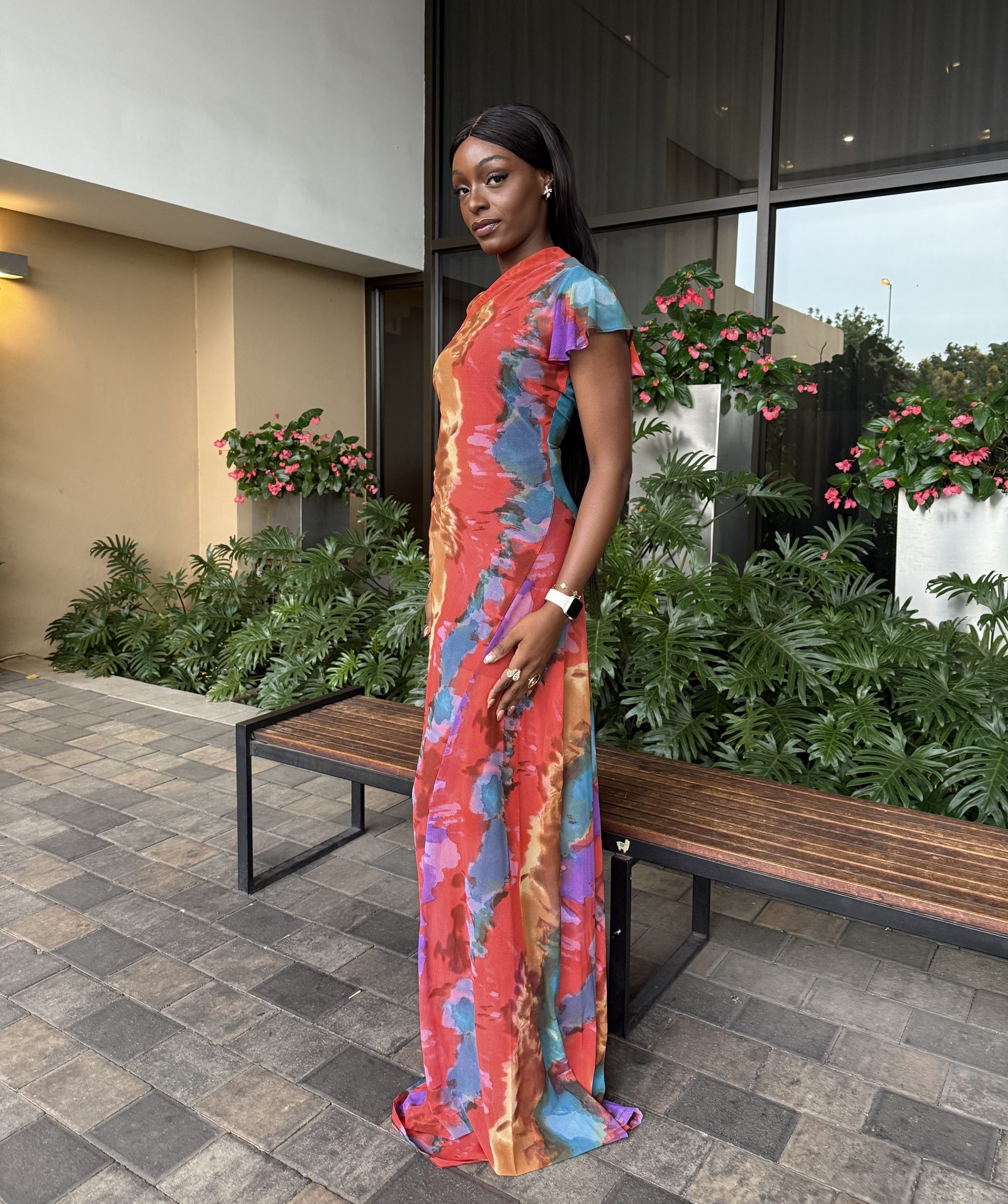Chidirim Ndeche in Bawsty Golden Hour Sling-Shoulder Maxi Dress