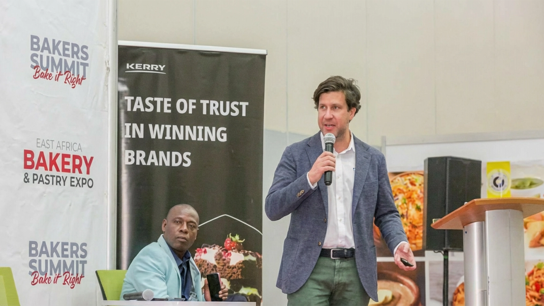 Leonel Figueira speaking at a bakery event