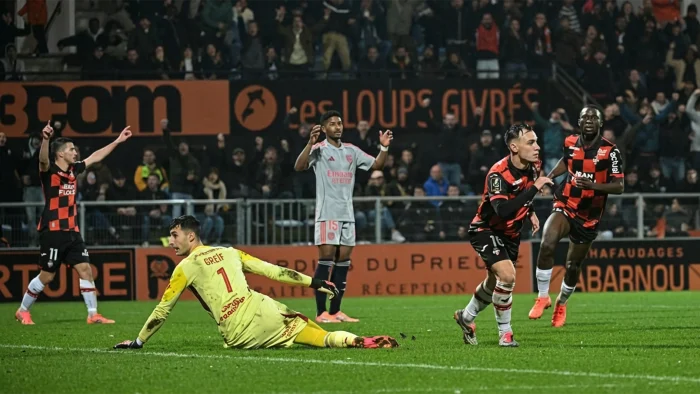 Lorient’s French forward Pablo Pagis (2nd R) celebrates after scoring his team first goal during the French L1 football match between FC Lorient and Olympique Lyonnais