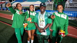 NSC Director General, Bukola Olopade with some victorious athletes during the 2025 CAA U18 U20 Championships in Abeokuta
