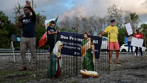 OCHOPEE, FLORIDA – DECEMBER 21: A Nativity scene depicting the birth of Jesus Christ, featuring Mary and Joseph in cages as they are held in custody, sits near the entrance to “Alligator Alcatraz” on December 21, 2025, in Ochopee, Florida. The depiction, activists said, represents a family separated from their baby as they demand that the detention camp be shut down, that the people being detained be freed, and that ICE sweeps end. Joe Raedle/Getty Images/AFP (Photo by JOE RAEDLE / GETTY IMAGES NORTH AMERICA / Getty Images via AFP)