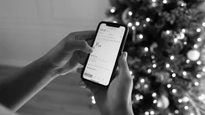 Nigerian trader using mobile devices to monitor forex markets