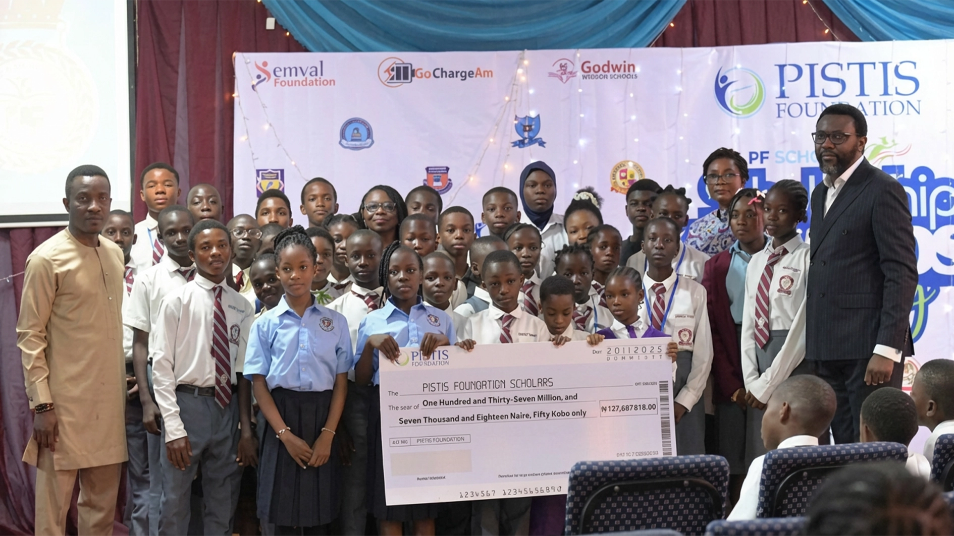 Some beneficiaries of the scholarship scheme with officials of Pistine Foundation at the prize presentation