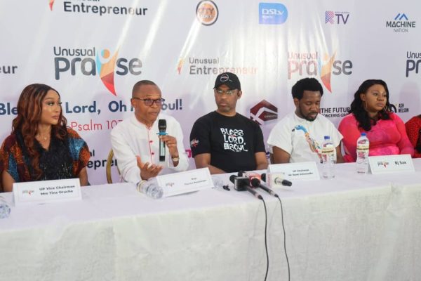 Vice Chairman, Unusual Praise (UP), Mrs Tina Oruche; Convener, UP,  Monsignor Pascal Nwaezeapu; Chairman, UP, Mr Ikem Umezuoke; Music Ministers BJ Sax at the Unusual Praise press briefing.