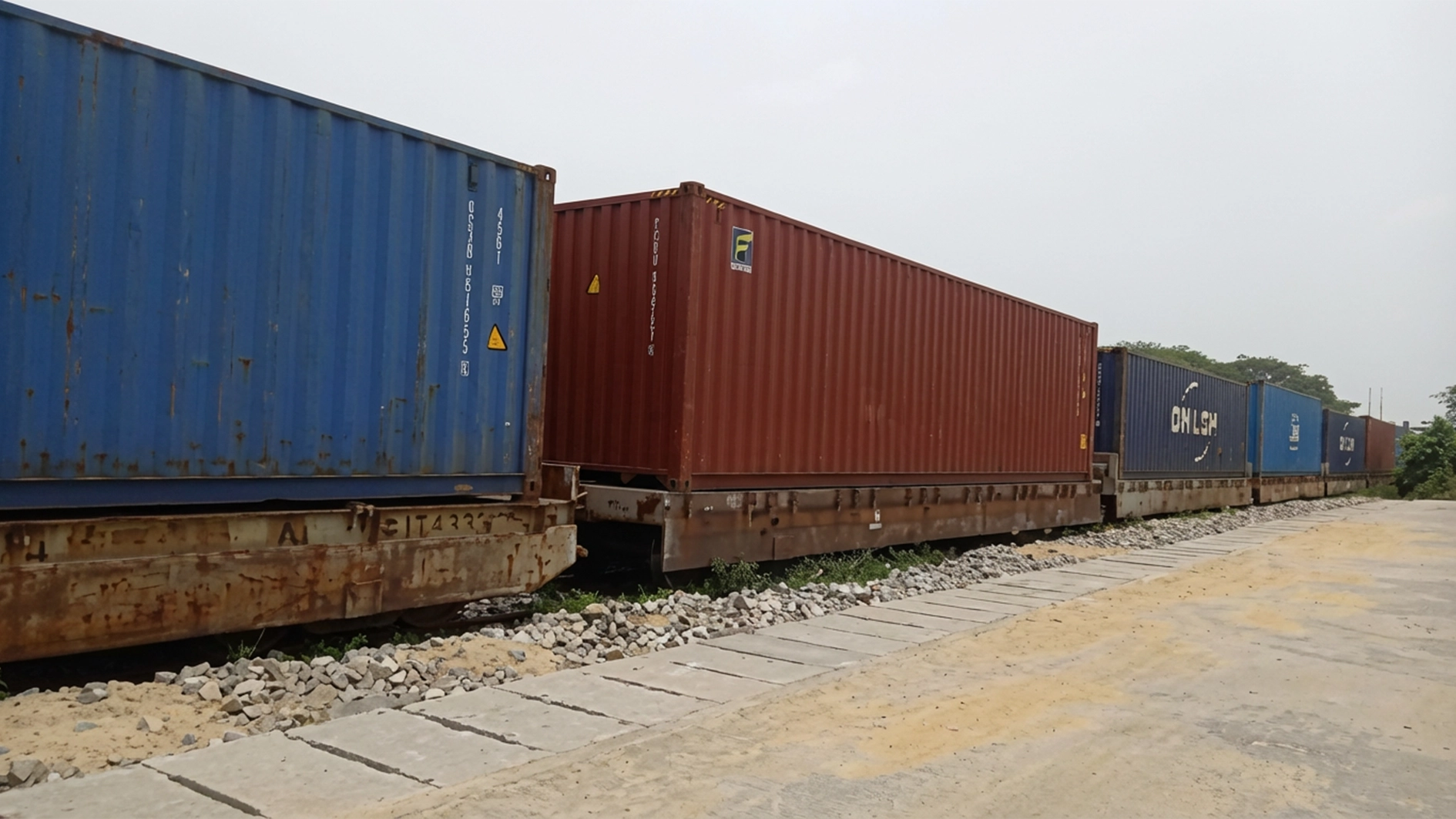 Container wagons at Ebutte Meta rail yard.
