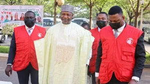 Former Attorney-General of the Federation, Abubakar Malami (middle), arrived at the Federal High Court