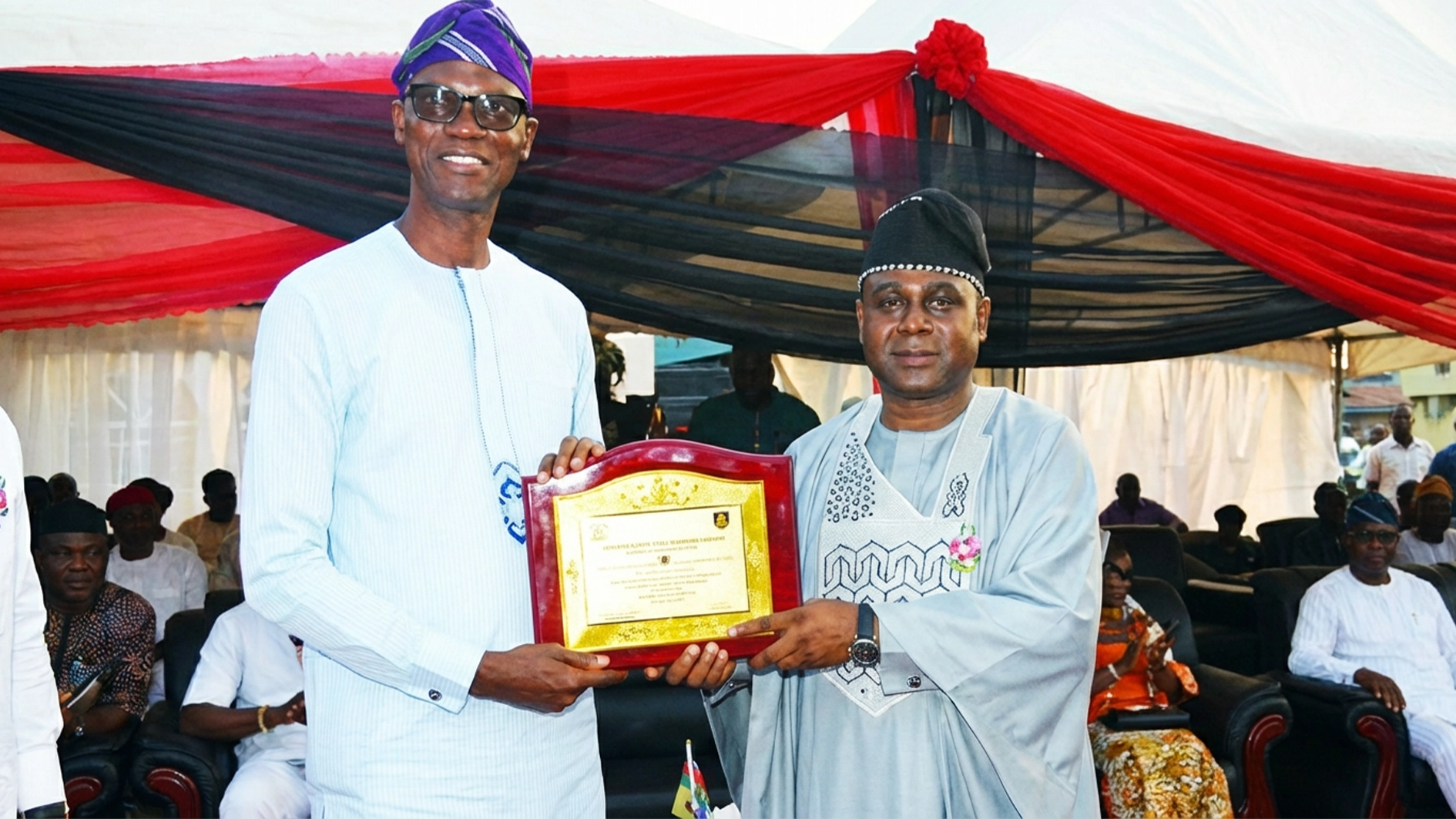 GOC, 81 Division Nigerian Army, Major General Farouk Mijinyawa (right) presenting a plaque to the Chief of Staff to Governor Babajide Sanwo-Olu, Toyin Akinmade Ayinde during the event