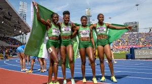 Gold medallists Nigeria’s Tobi Amusan, Nigeria’s Favour Ofili, Nigeria’s Rosemary Chukwuma and Nigeria’s Nzubechi Grace Nwokocha pose after the women’s 4x100m relay final athletics event at the Alexander Stadium, in Birmingham (Photo by Glyn KIRK  AFP)