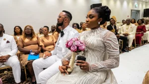 Pastor Chris Okafor and his wife during their wedding ceremony in Lagos