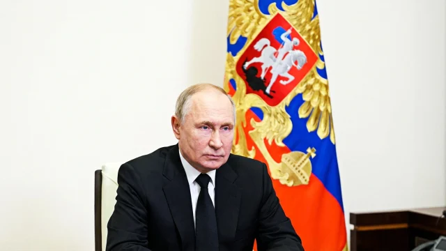 Russia’s President Vladimir Putin delivers his address in Moscow