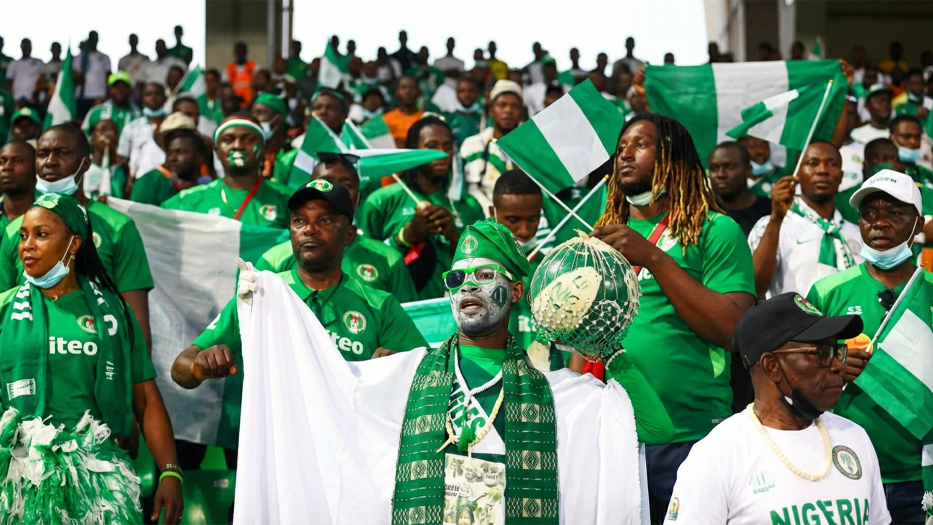 Super Eagles supporters Club members cheering the team in a Group A game against Equatorial Guinea