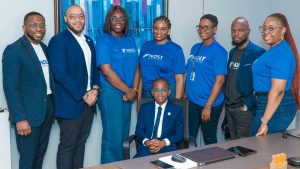 Image of young Nigerian student Toyeosa Omoruyi along with officials of NOLT Finance