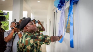 Vice Admiral Idi Abbas unveiling newly constructed Junior Rates Permanent Accommodation Blocks in Calabar