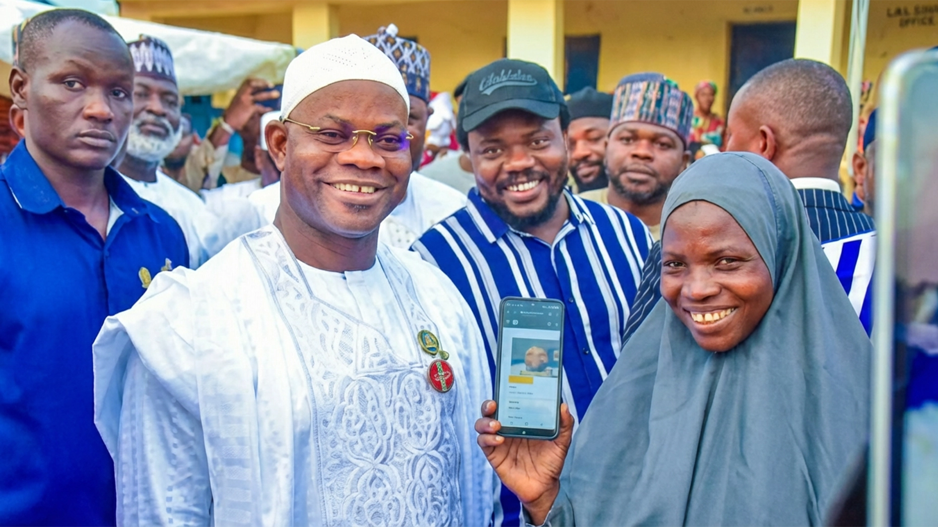 Yahaya Bello (in white) and APC members during the electronic registration exercise in Kogi State