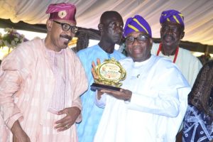 Ogun State Head of Service, Kehinde Onasanya, with his award