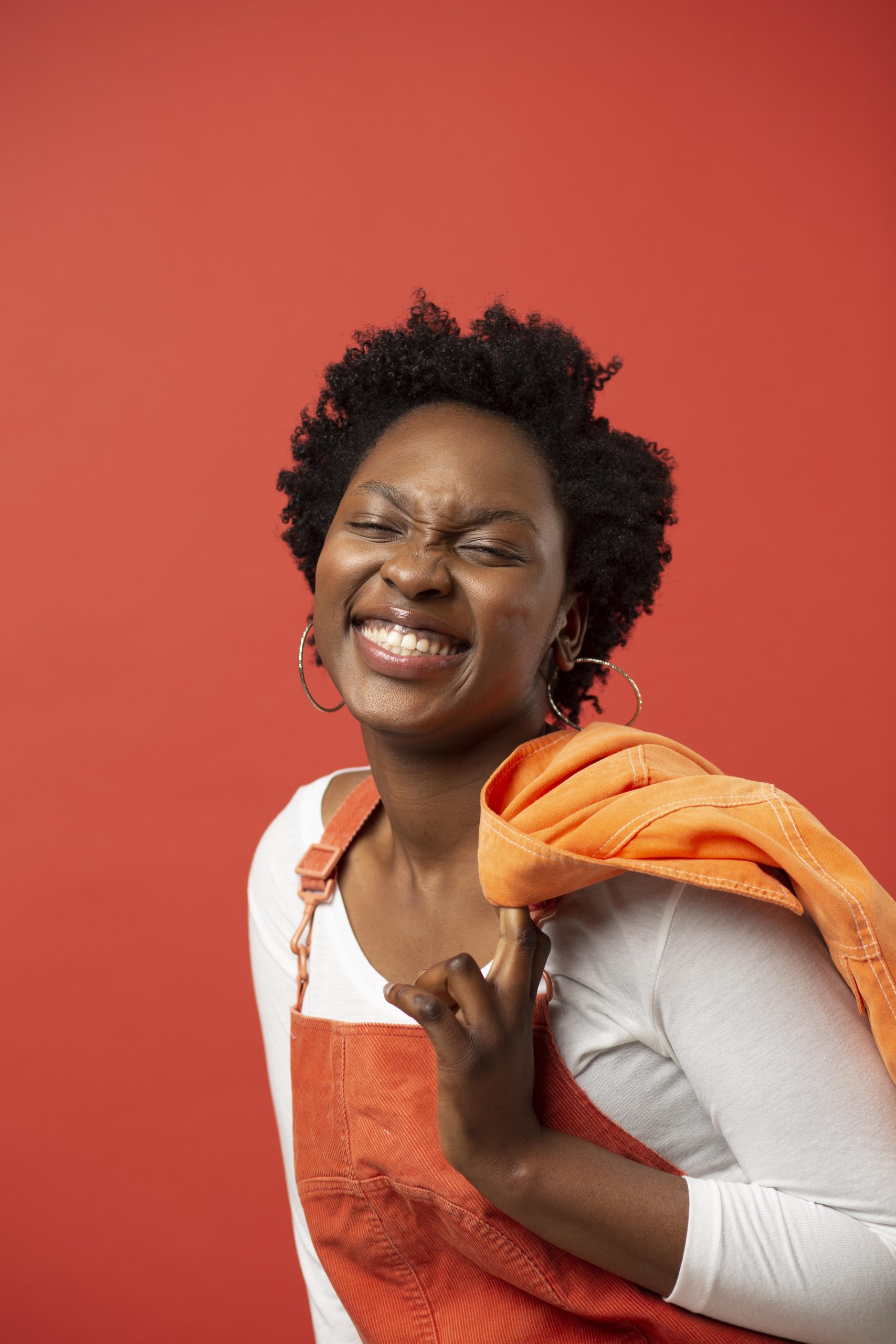 medium-shot-smiley-woman-posing. Photo by Freepik 