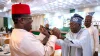 The Minister of Works, Sen. David Umahi (L) and President Bola Ahmed Tinubu (R)