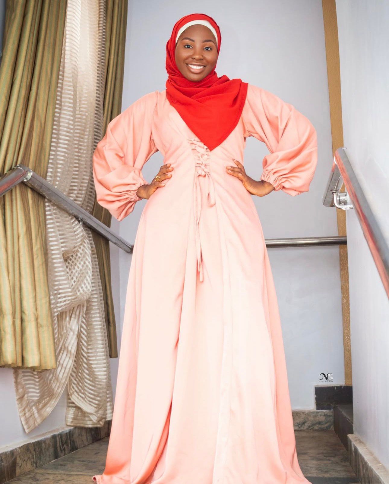 Peach lace-up front gown from House of Anaum's collection by Lateefat Odunuga