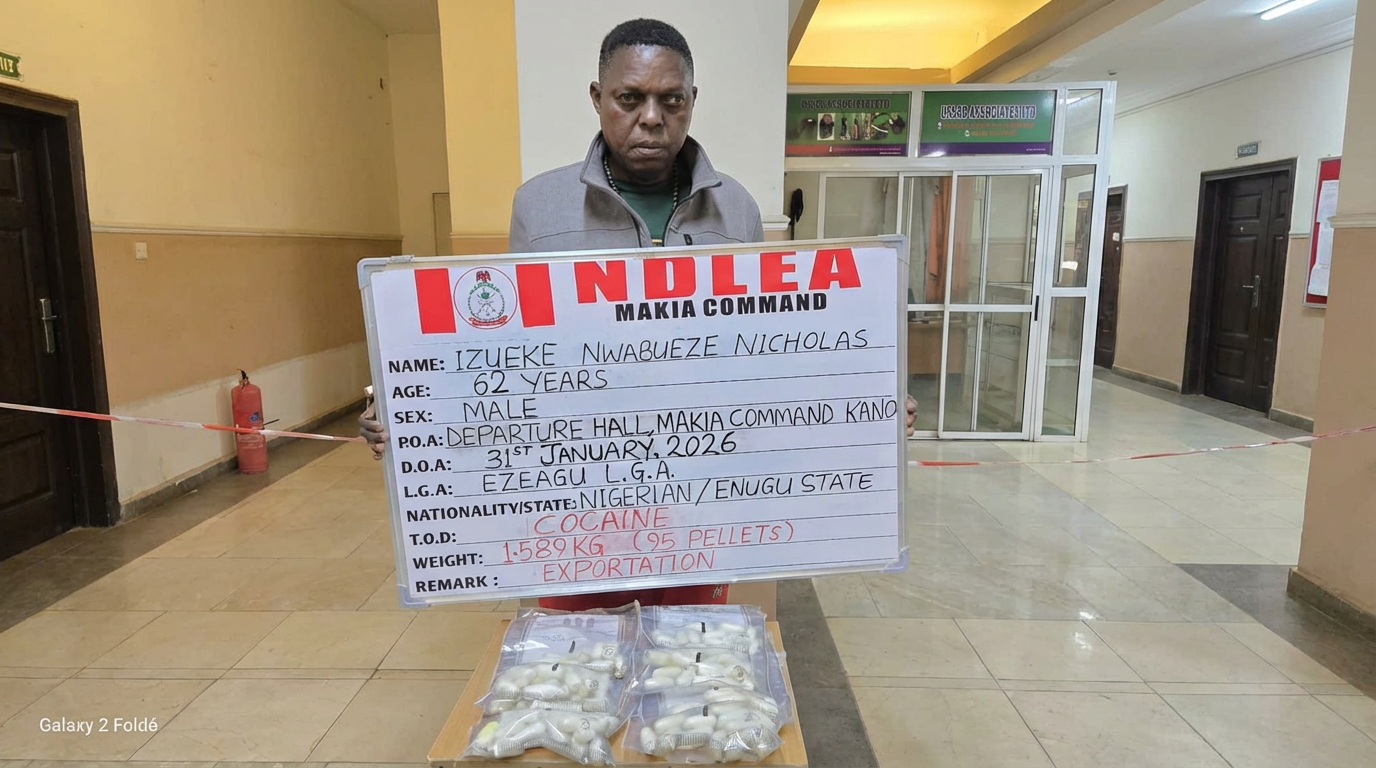 Suspect with seized items.