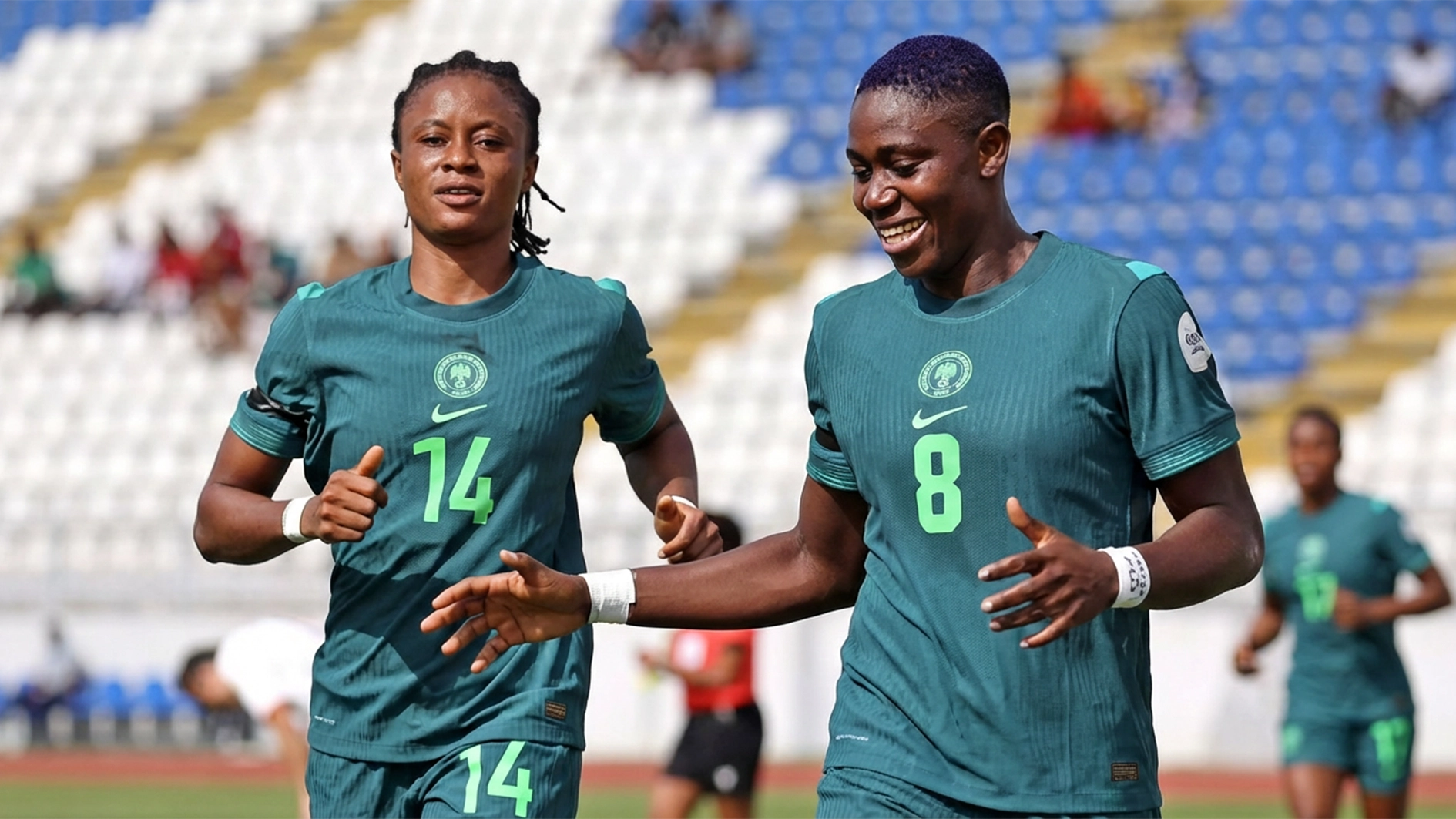 Asisat Oshoala (right) and Oluwatosin Demehin celebrating one of Super Falcons’ goals against Tunisia at the WAFCON in Morocco on Sunday.