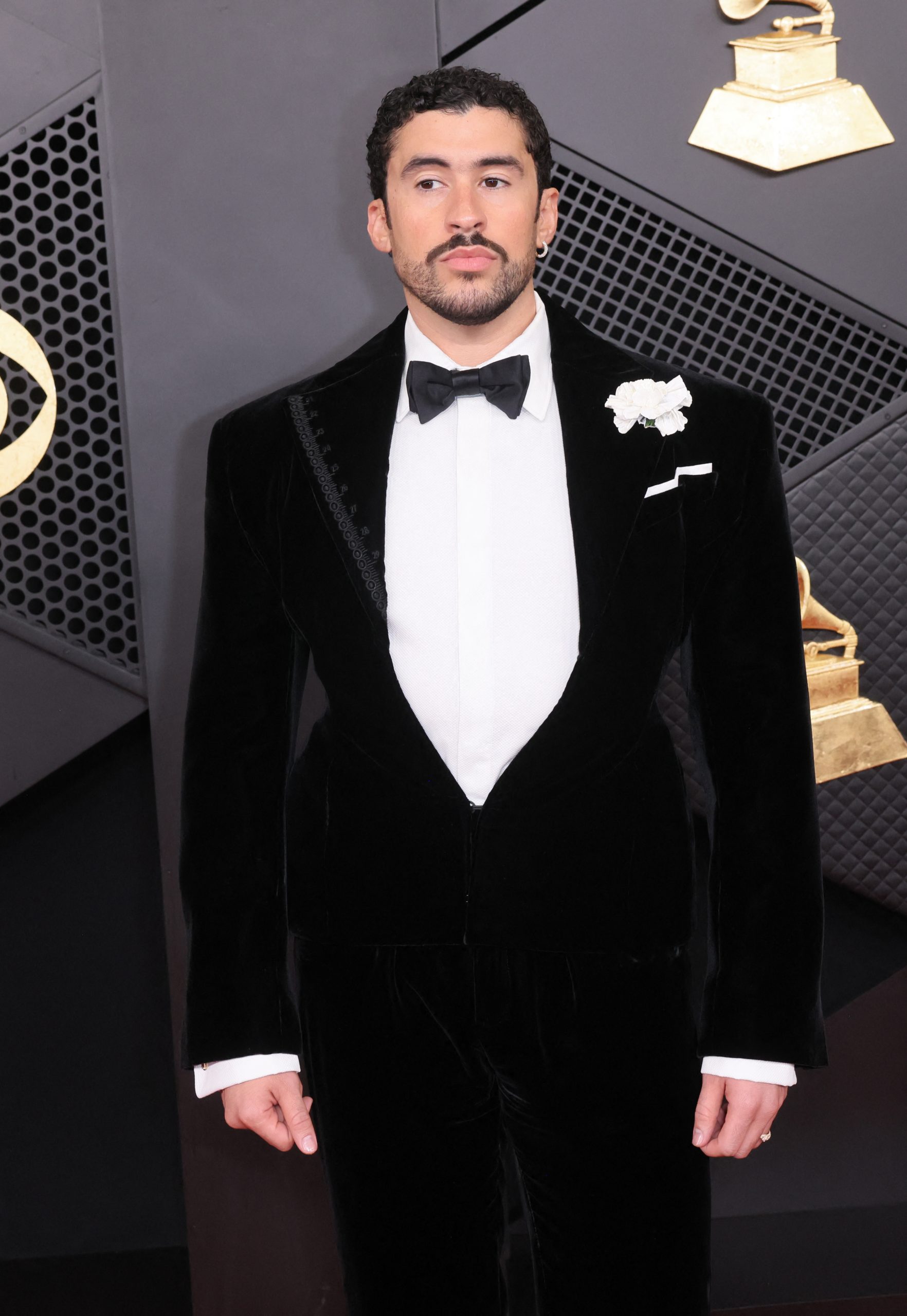 Puerto rican singer Bad Bunny arrives for the 68th Annual Grammy Awards at the Crypto.com Arena in Los Angeles on February 1, 2026. (Photo by Etienne Laurent / AFP) / -- IMAGE RESTRICTED TO EDITORIAL USE - STRICTLY NO COMMERCIAL USE --