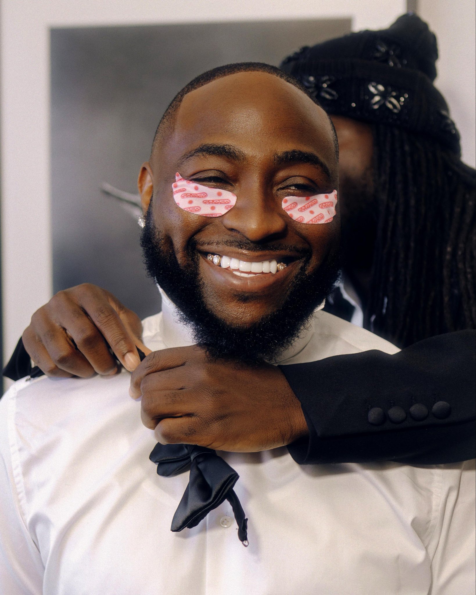 Davido smiles backstage at Grammy Awards ceremony