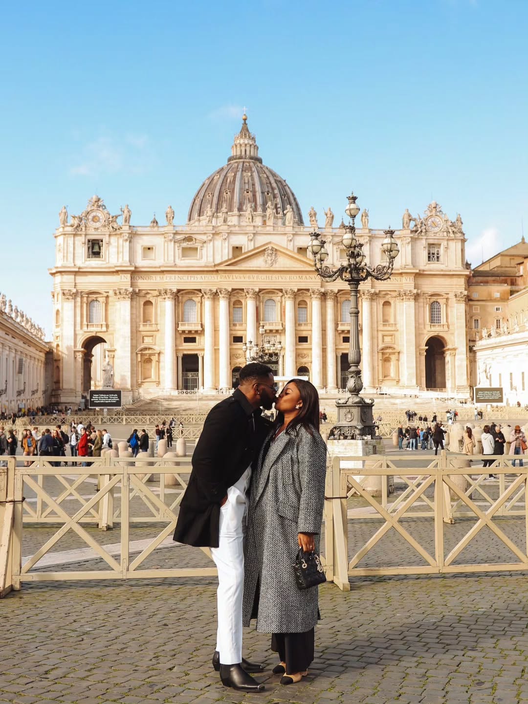 Ebuka Obi-Uchendu and wife Cynthia share a kiss in front of St Peter’s Basilica during 10th wedding anniversary in Rome