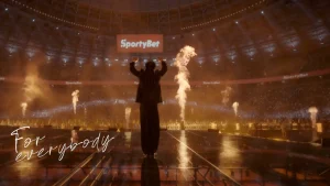 Grammy winner Burna Boy brings signature superstar energy and takes Sporty Group partnership to television screens globally.