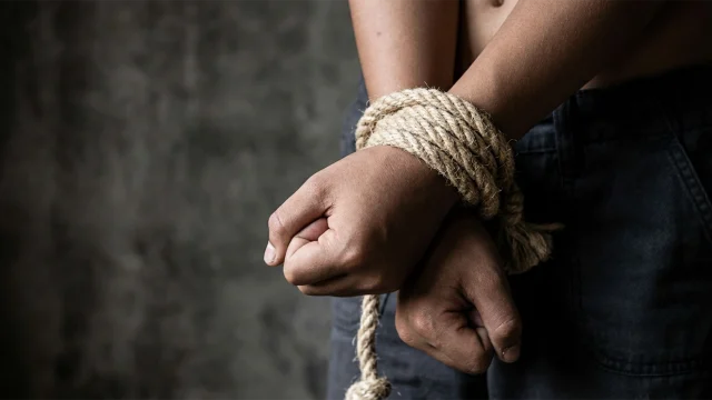 Hands Tied Up With Rope Of A Missing Kidnapped, Abused, Violence