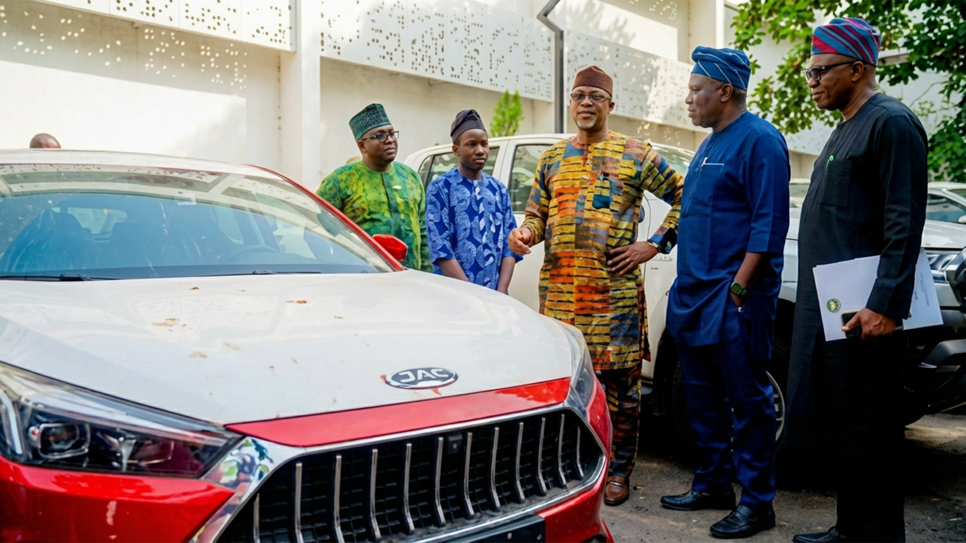 Nigeria’s Best Teacher, Solanke Francis Taiwo (2nd left); Ogun State Governor, Dapo Abiodun; and other officials at the reception for the award-winning teacher in Abeokuta… on Friday.