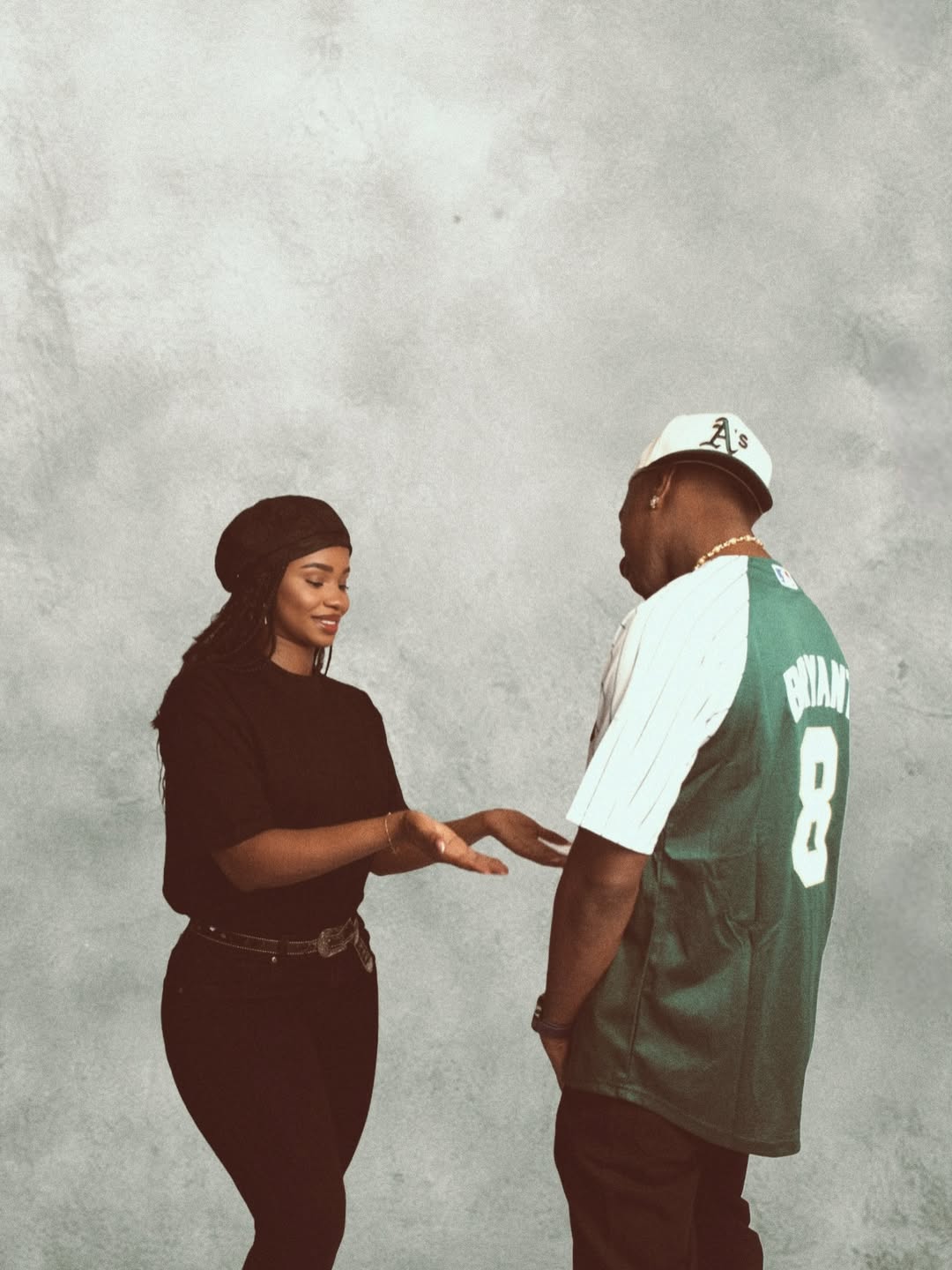 Priscilla Ojo and Juma Jux pose in a 90s inspired photoshoot recreating a classic Tupac image