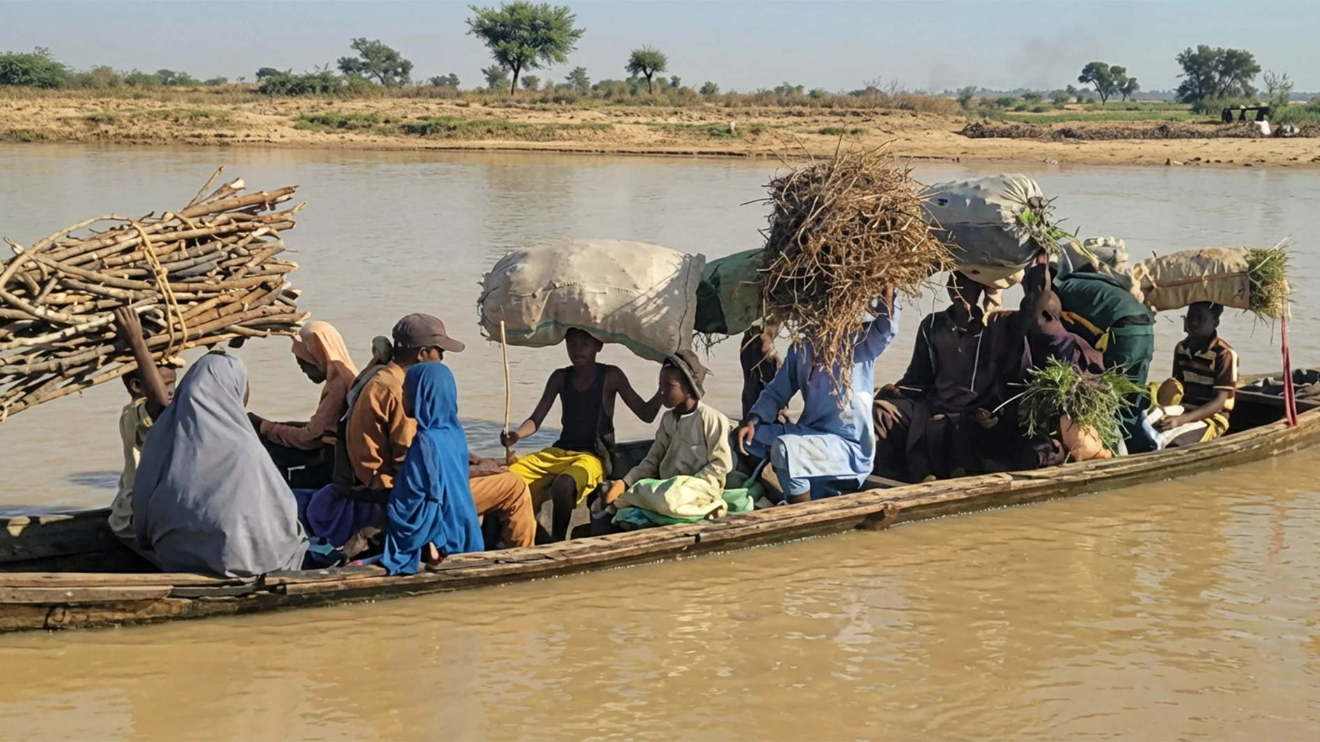 Some passengers with their luggage on board an ill-fated canoe that capsized in Dundaye Community, where five persons died.